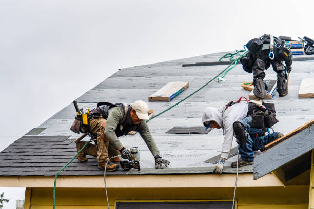 Professional Gutter Installation technician working in Smithville, NJ
